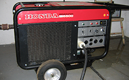 Backup generator with wheels on a concrete floor